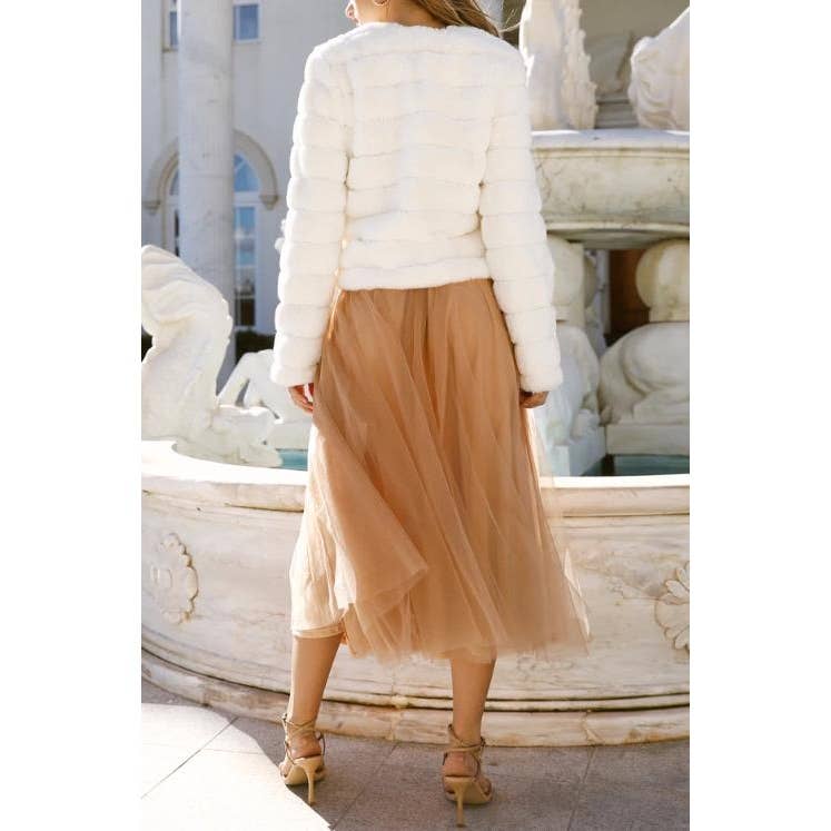 Veste d'hiver en fausse fourrure blanche