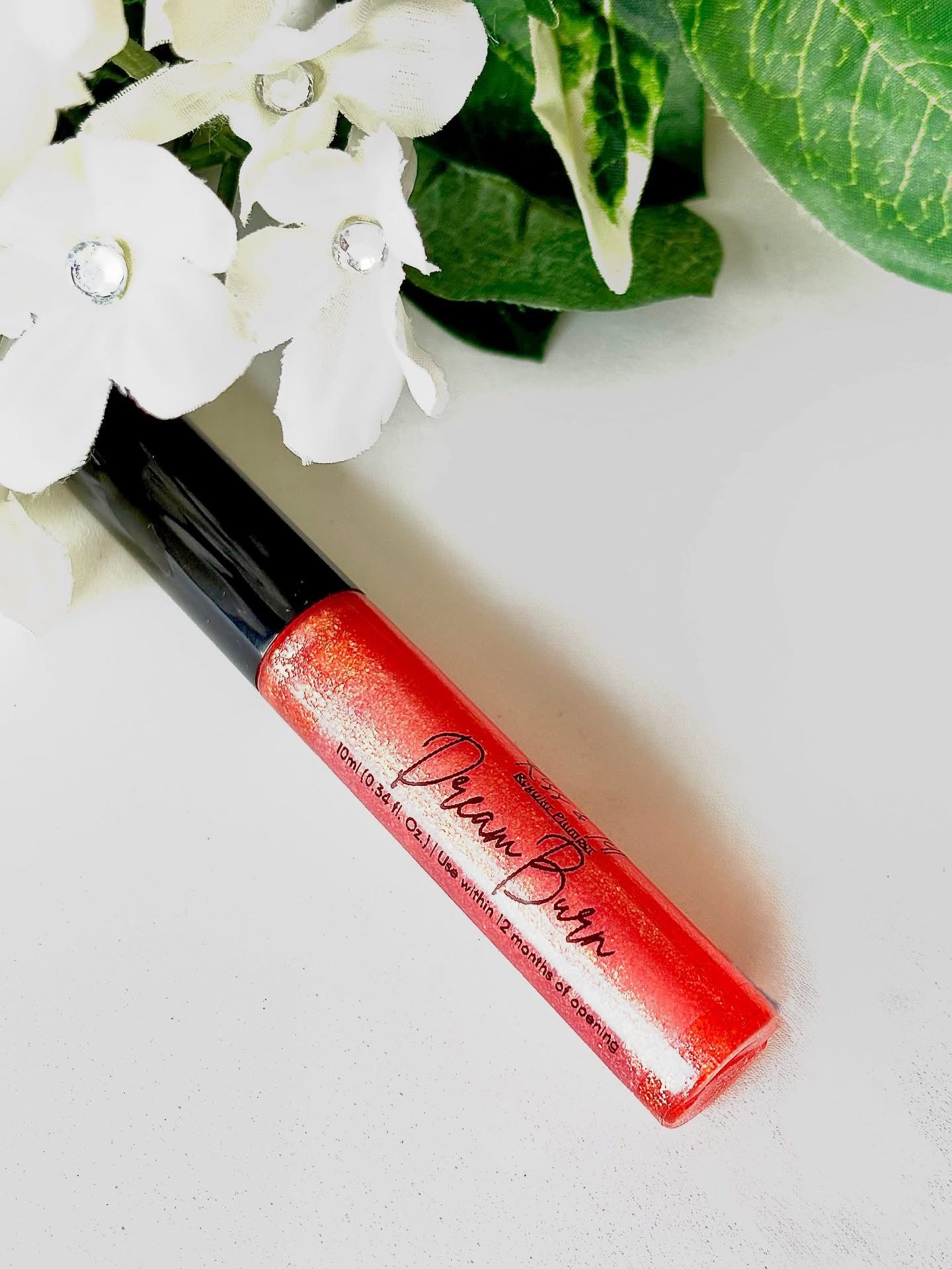 Kiss & Tell handcrafted lip gloss