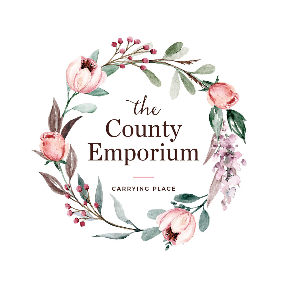 The county emporium carrying place soft floral wreath simple soft sage and blush tiny red berries and purple lilac done in watercolour 