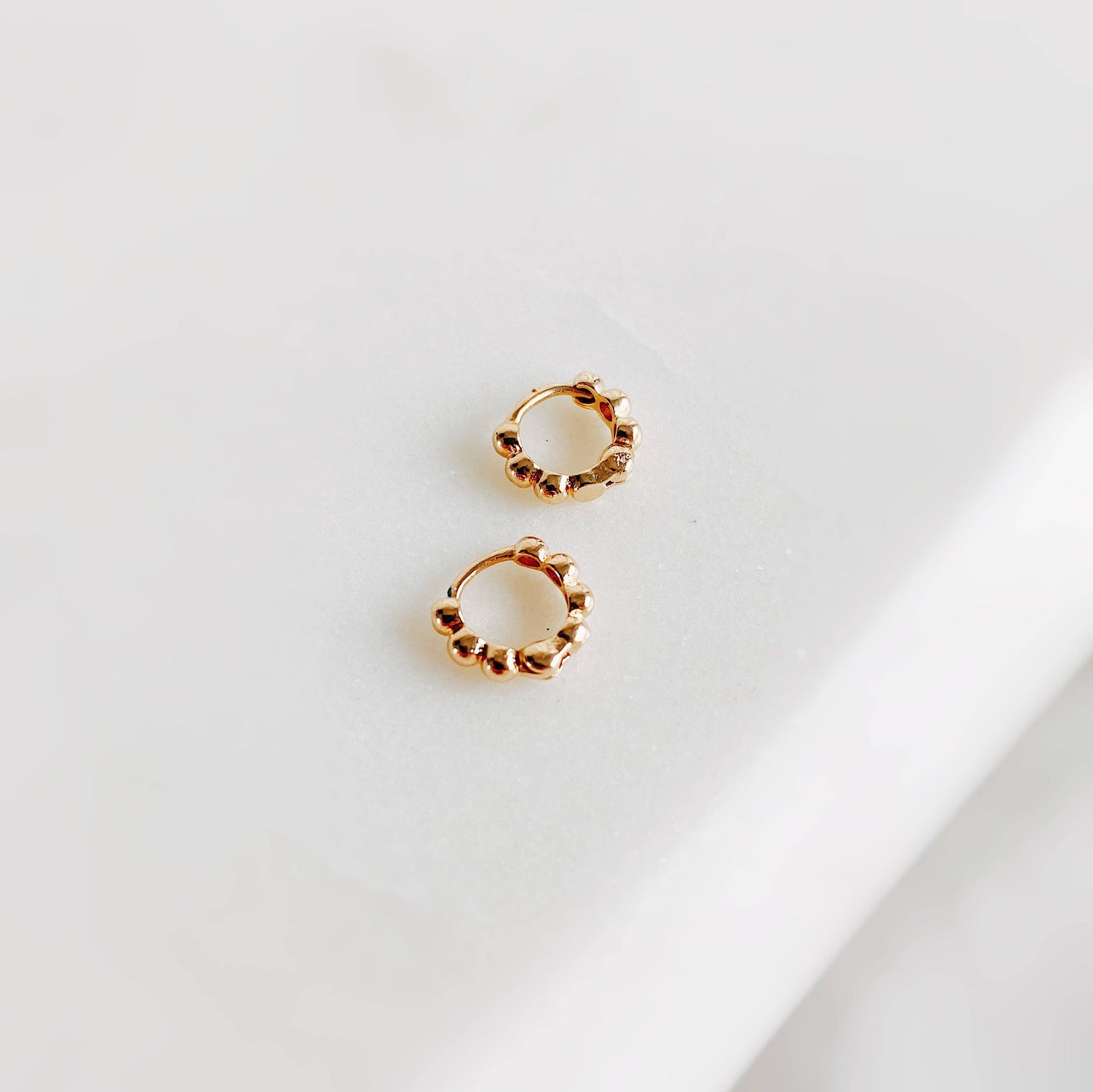 Mini Dotties gold hoop earring
