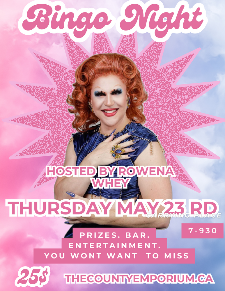 Drag bingo hosted with queen Rowena Whey in Prince Edward county Trenton quinte Thursday, May 23 prizes bar, fun evening event picture is tie-dye, pink and blue background glittery star picture of Rowena in the front red hair blue eyeshadow pretty hair is done 70s dress sleeveless almost type style look but in dress style arms, blue fingernails, vintage jewellery rings, big smile, very happy, beautiful bubble, lettering, pinkwith the above information on it timing 7 to 930 website on bottic County