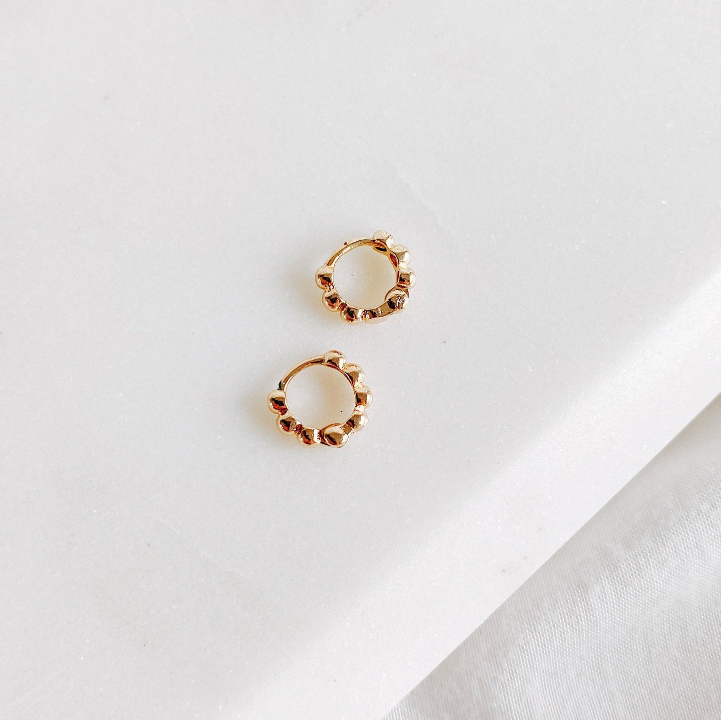 Mini Dotties gold hoop earring