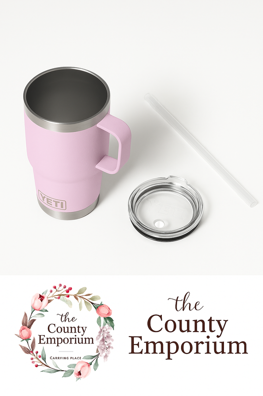 Pastel pink cherry blossom YETI travel mug with handle, clear lid, and straw styled on a clean white background. Perfect reusable tumbler for coffee, iced drinks, and everyday use. Available at The County Emporium, Carrying Place boutique