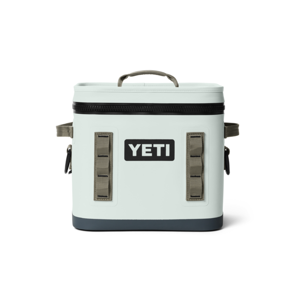 A YETI hopper insulated cooler  bag in ridgeline green color with a black bottom base, black zipper, and gray handles, shown on a solid white background.