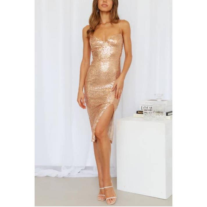 Gold sequin dress slim fit, fitted bodice with moulded cups spaghetti strap, lace up back and with sid