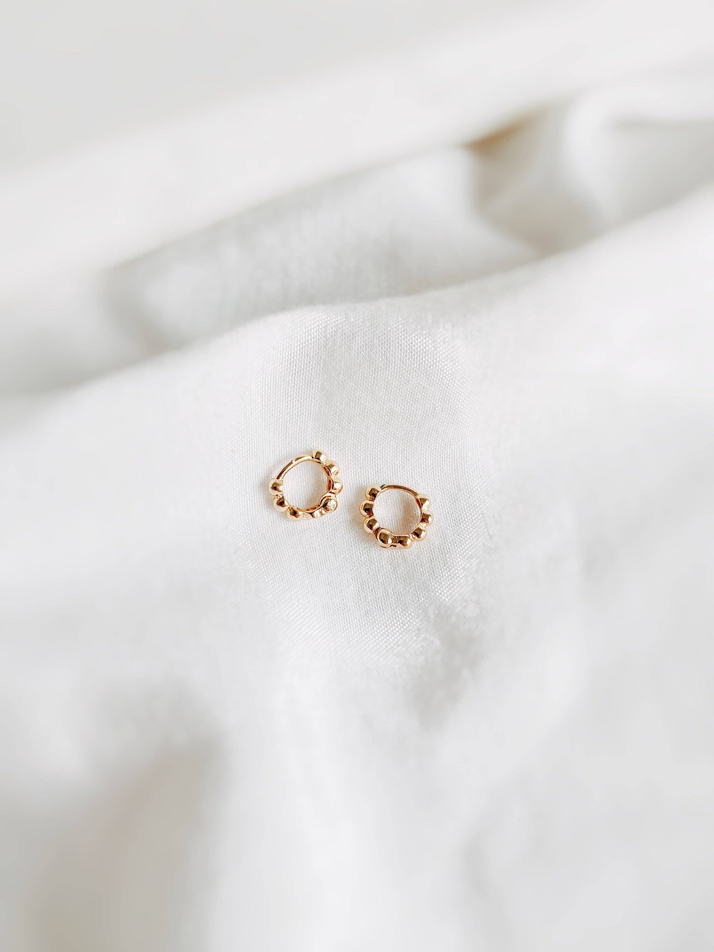 Mini Dotties gold hoop earring