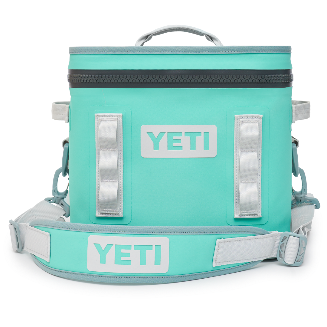 YETI Hopper Flip 12 soft cooler in aquifier blue with zippered top, carry strap and accessory loops