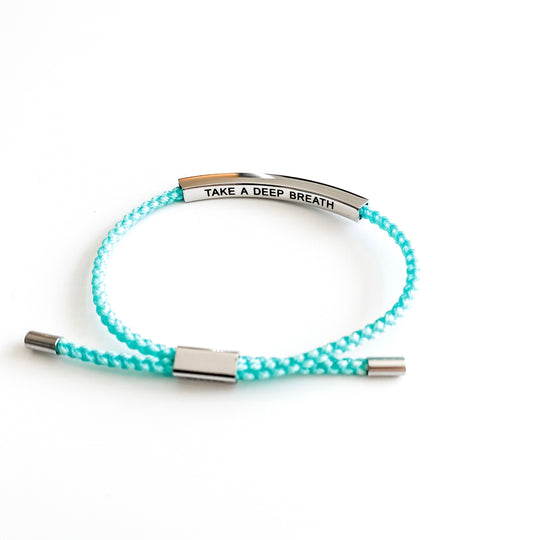 
                
                    Load image into Gallery viewer, Glass House Goods Our Girls braided bracelet &amp;quot;Take a deep breath&amp;quot; in turquoise
                
            