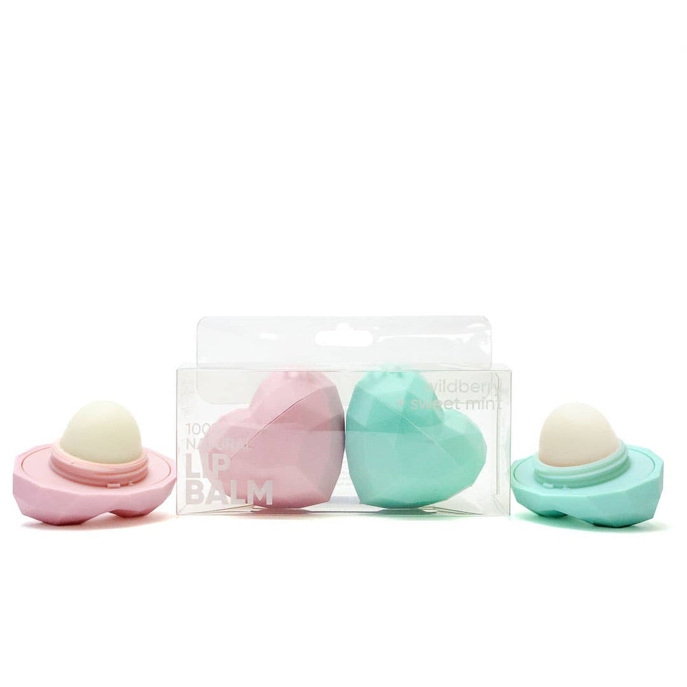 ￼ rebels refinery, two pack heart shaped lip balms, ￼light pink, and sea foam hearts packaged in clear acrylic rectangular box 