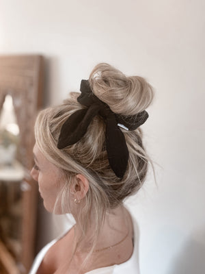 amelia rose the label canadian designer soft cotton oversize scrunchie with cute bunny tails shown in black on high diy top knot bun 